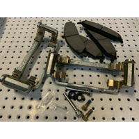 NEW FRONT CALIPER SUPPORTS &amp; CERAMIC BRAKE PADS &amp; PINS FORD FALCON BA  BF   FG.